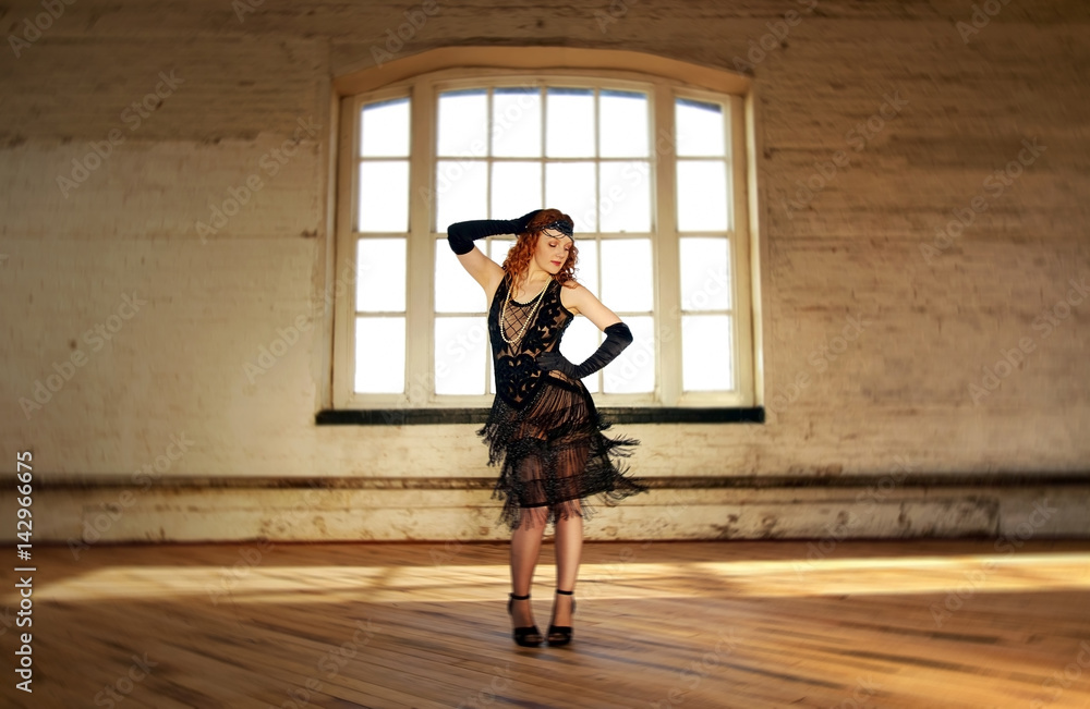 Beautiful Flapper dancer with black bugle bead see through dress, head dress and long red hair; dancing Beautiful Flapper dancer with black bugle bead see through dress, head dress and long red hair; dancing