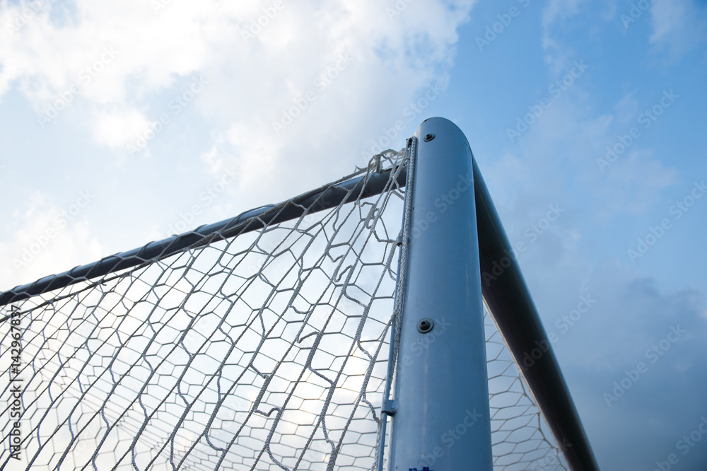 soccer goal against cloudy sky background.. soccer goal against cloudy sky background..
