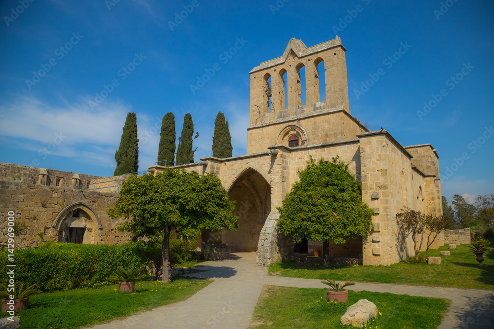 Bellapais Abbey  is the ruin of a monastery built by Canons Regular in the 13th century on the northern side of the small village of Bellapais now in Turkish-controlled Northern Cyprus.