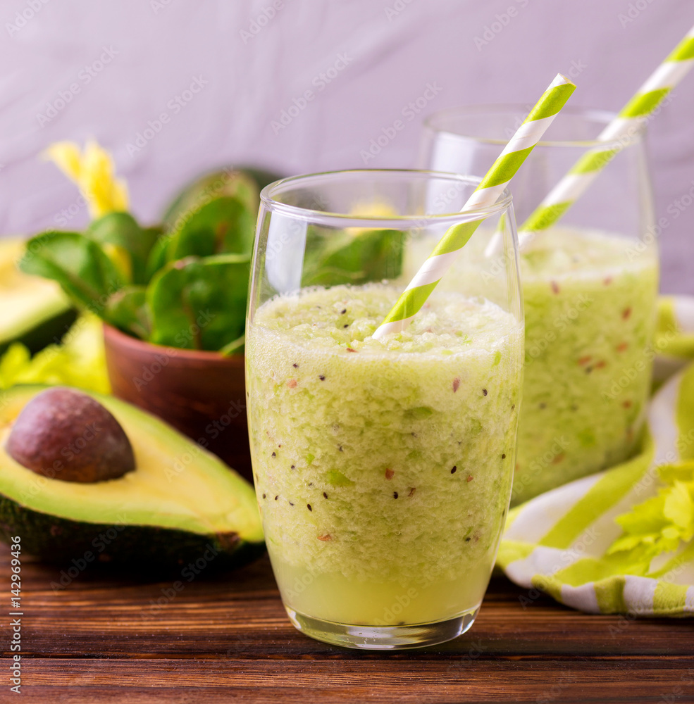 Green smoothie with avocado, spinach and celery. Healthy food Green smoothie with avocado, spinach and celery. Healthy food