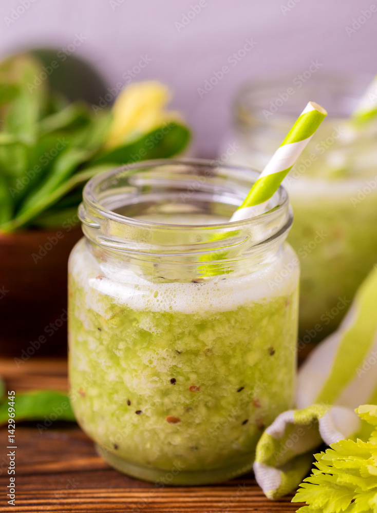 Green smoothie with avocado, spinach and celery. Healthy food Green smoothie with avocado, spinach and celery. Healthy food