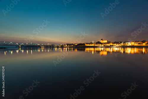 City of Torun in Poland, old town skyline by night from Vistula river © Lukasz Janyst