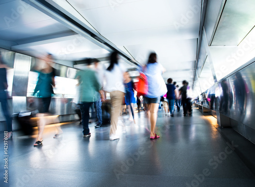 People rushing in the lobby. motion blur