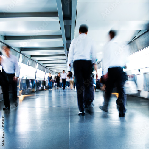 People rushing in the lobby. motion blur