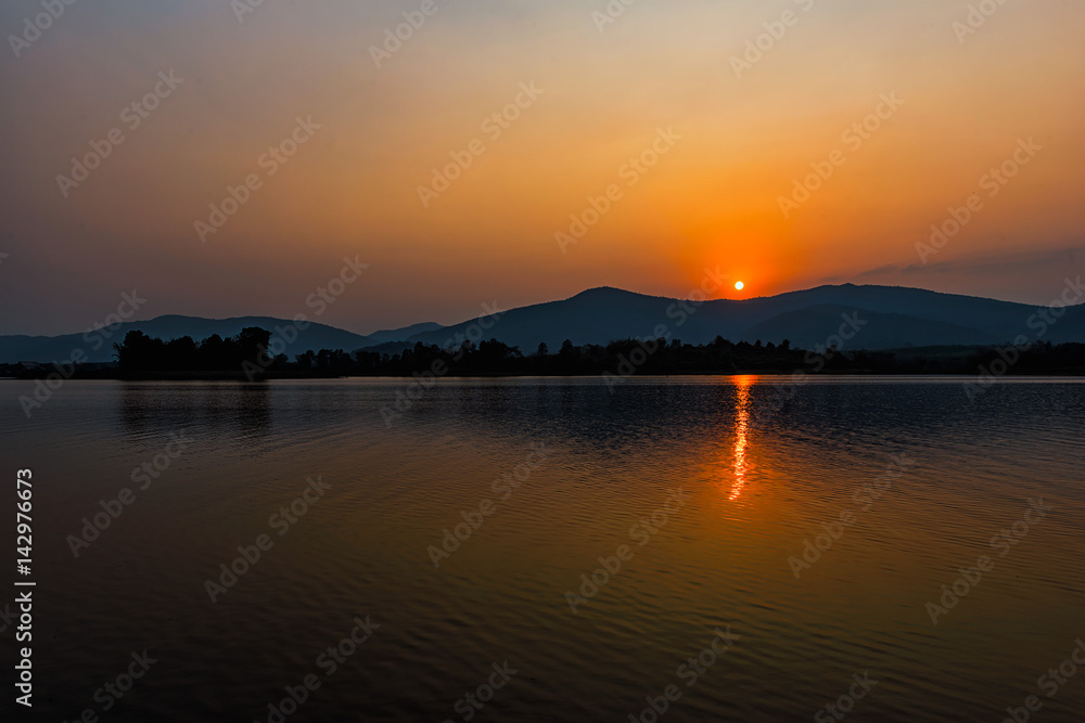 Huai Sak lake at sunset in Chiang Rai,Thailand Huai Sak lake at sunset in Chiang Rai,Thailand