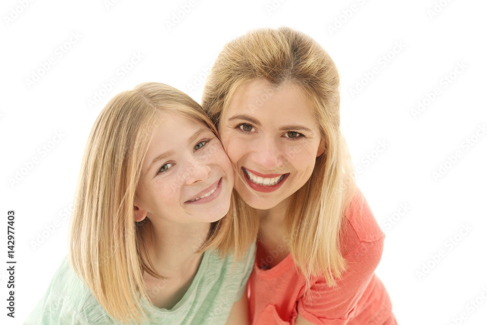 Happy mother and daughter on light background Happy mother and daughter on light background
