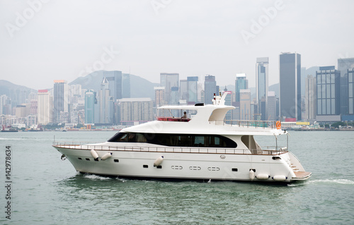 Beautiful scene of Hong Kong skyline, view along Victoria Harbor. © xy