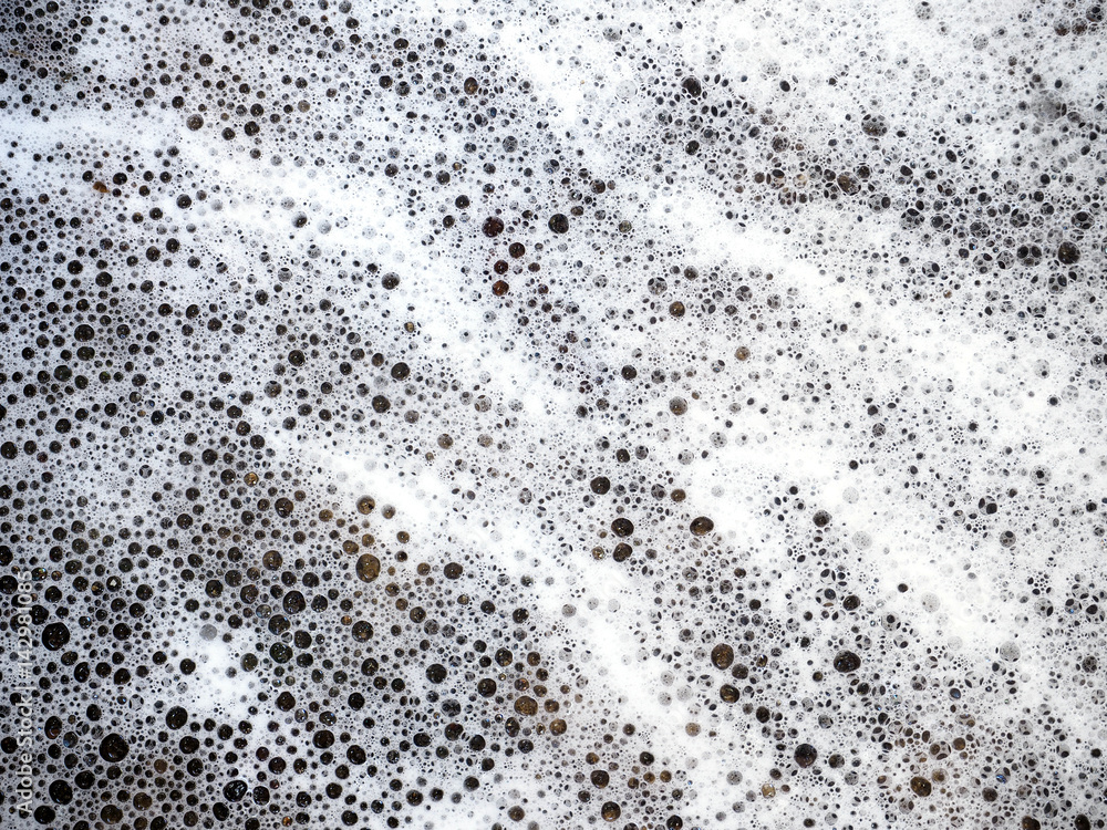 Abstract backgrounds of soap foam or wash powder bubbles Abstract backgrounds of soap foam or wash powder bubbles