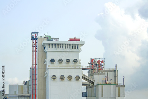 Factory of animal feed in the dayligth photo