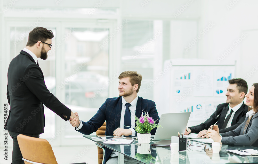 handshake Manager and the client before signing a contract in th handshake Manager and the client before signing a contract in th