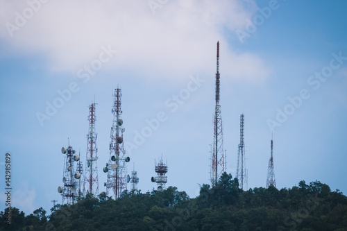 Big television and radio tower with several parabolic antenna on high  mountain