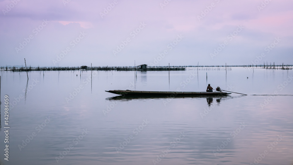 Gulf of Thailand long tailed boat southern of thailand floating on clear sea water Gulf of Thailand long tailed boat southern of thailand floating on clear sea water