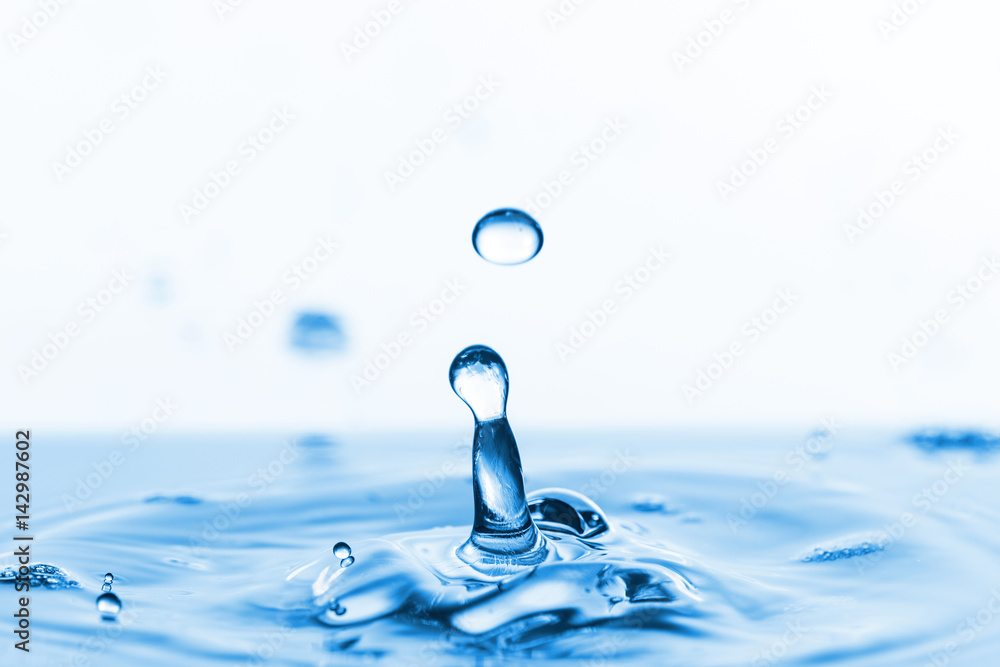Photo of water splashes and ripples background Photo of water splashes and ripples background