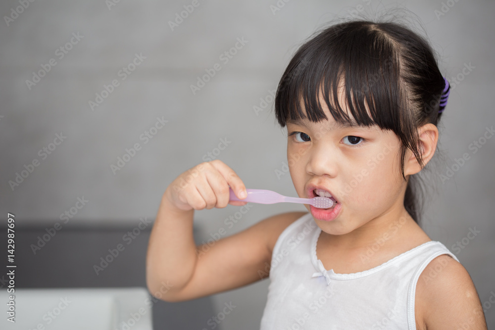 Little asian cute girl brush teeth Little asian cute girl brush teeth