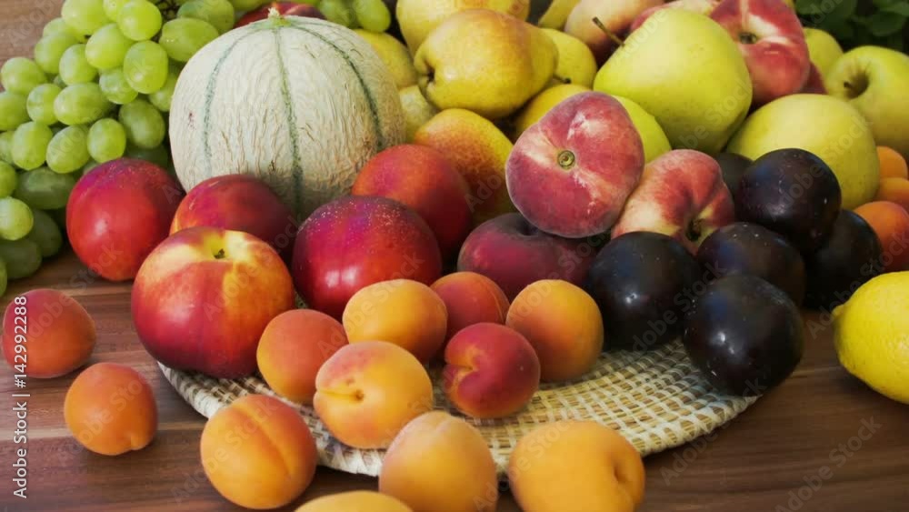 Autumn still-life of fresh fruit on a wooden table Autumn still-life of fresh fruit on a wooden table