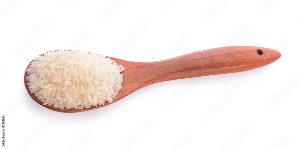 rice in wood spoon rice in wood spoon