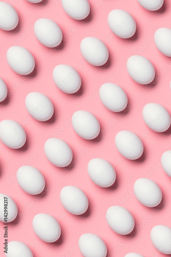 top view of rows of white eggs for easter. Happy Easter concept