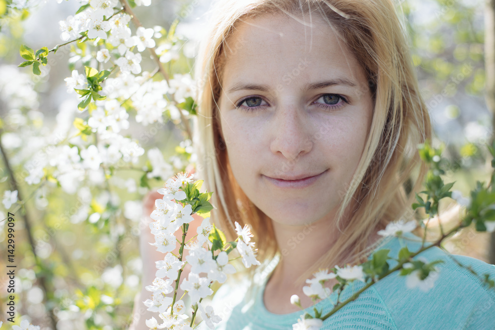 Natural woman portrait with blooming tree Natural woman portrait with blooming tree