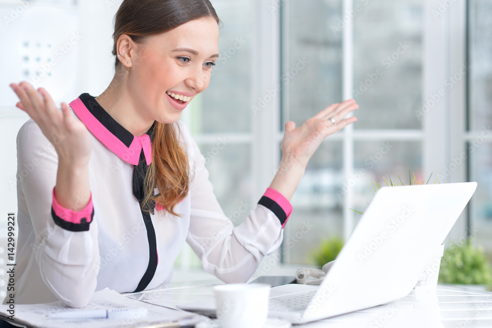 Portrait of a nice business woman using laptop Portrait of a nice business woman using laptop