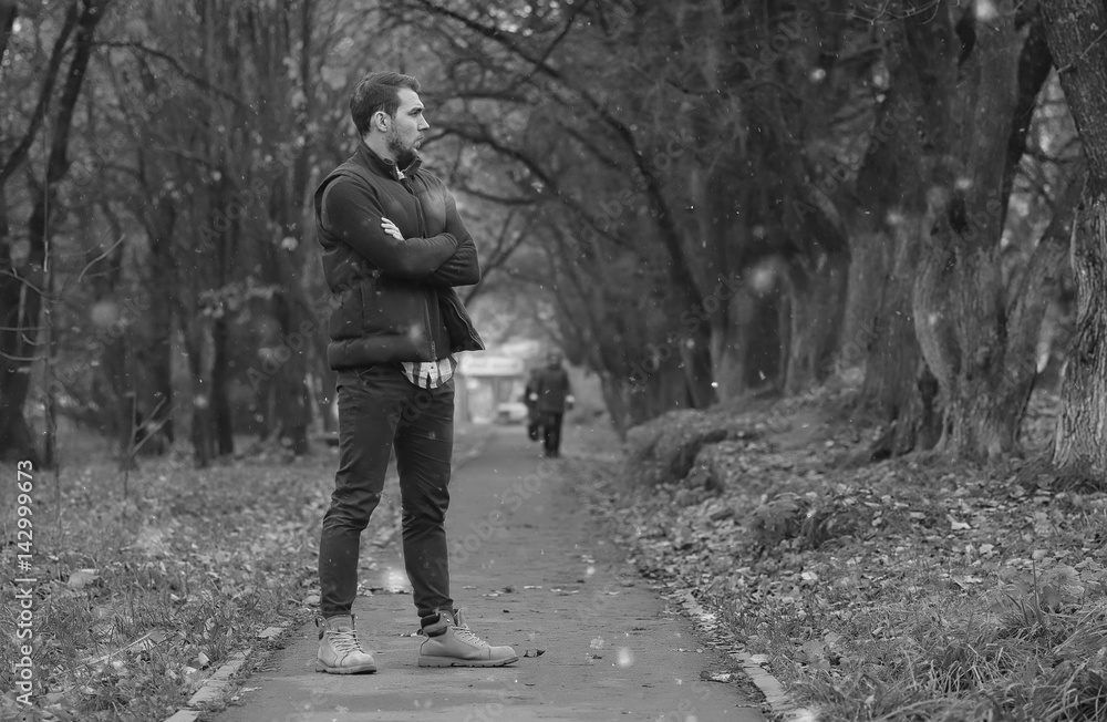handsome beard man in autumn park handsome beard man in autumn park