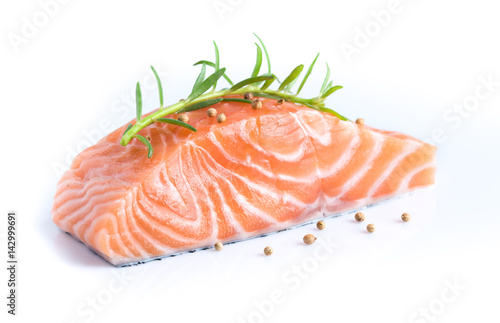 Sliced raw salmon on white background