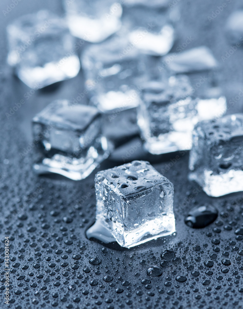 Ice cubes over dark background Ice cubes over dark background