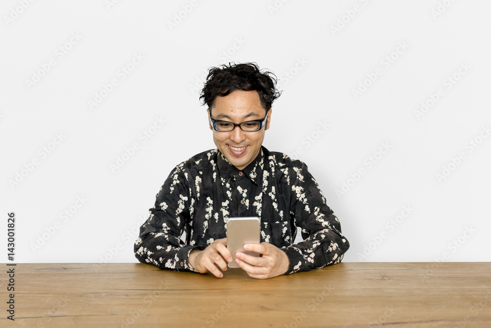 Man using phone to connect to the internet Man using phone to connect to the internet