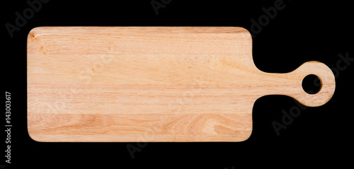 wooden cutting board on a black background,top view