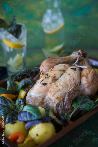 Chicken with vegetables baked with herbs 