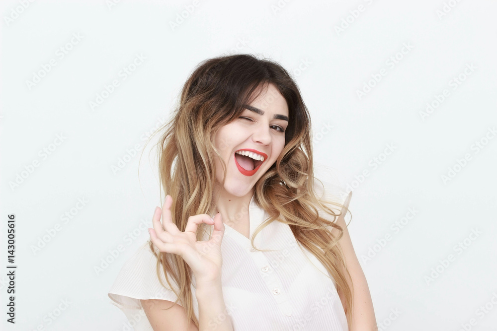 Smiling business woman shows emotion. isolated background Smiling business woman shows emotion. isolated background
