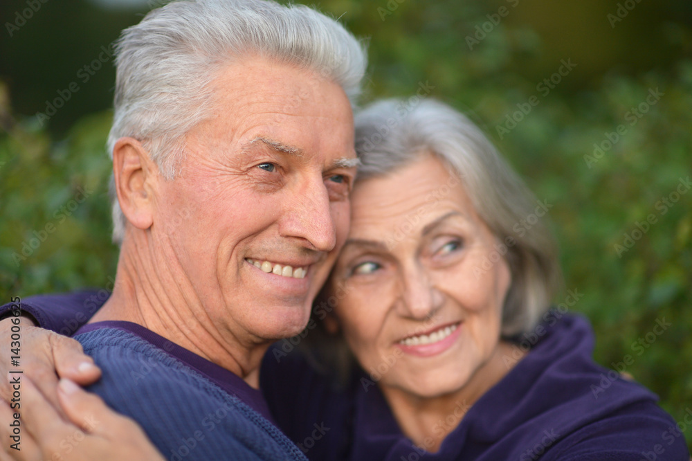 Happy elderly couple embracing Happy elderly couple embracing