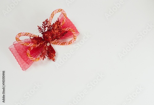 Red bow on white background. Isolated. Ribbon.
