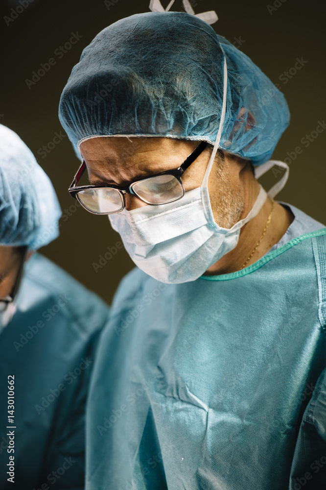 Surgeons operating Surgeons operating
