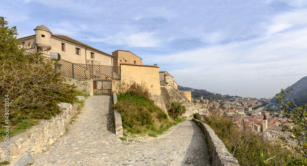 San Giovanni castle and village roofs, Finalborgo, Italy