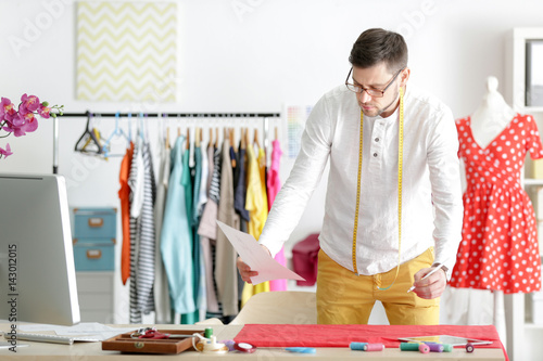 Young male fashion designer...