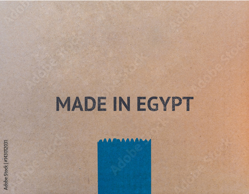 MADE IN EGYPT written on brown cardboard box with copy-space for your text.
