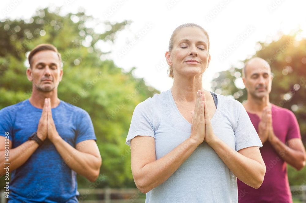 Class of yoga meditating