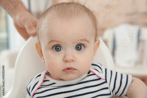 Adorable baby girl sitting ...