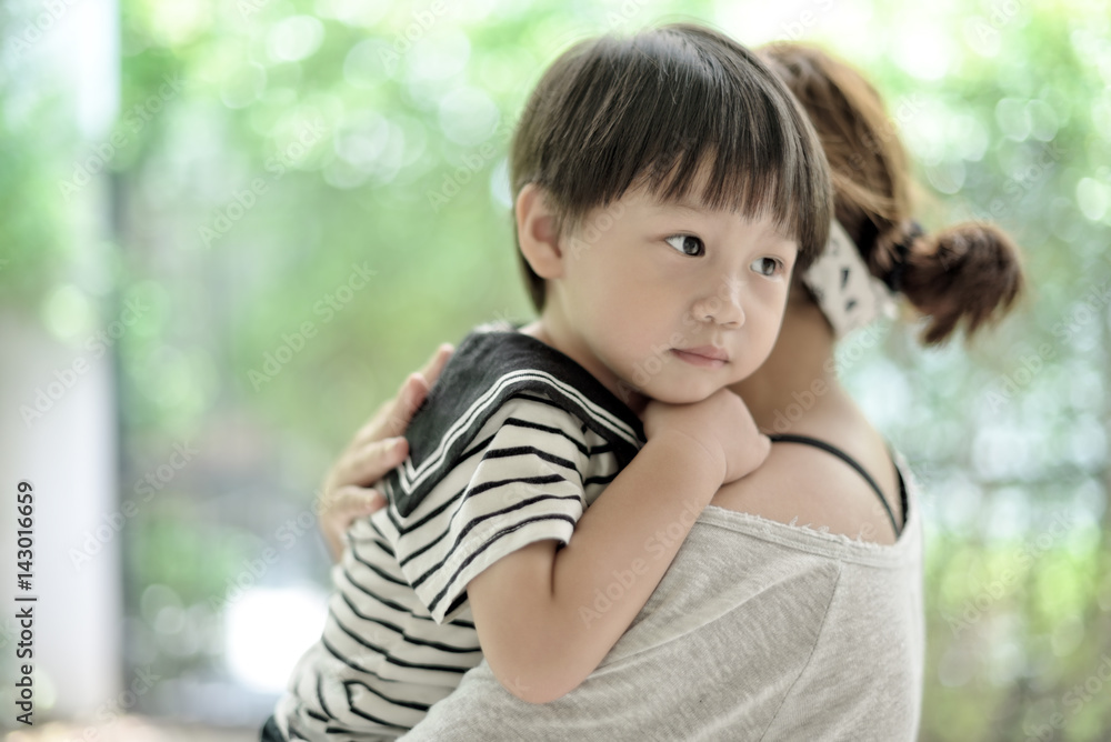 Little cute boy hugging her mother Little cute boy hugging her mother