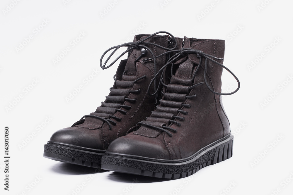 Boots on a white background closeup isolate Boots on a white background closeup isolate