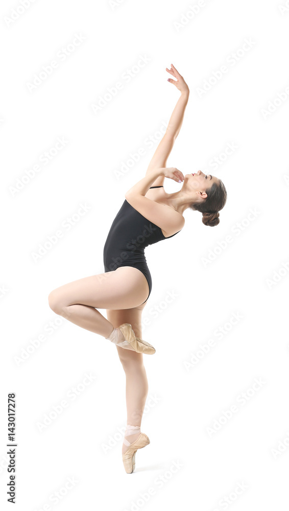 Obraz premium Young beautiful ballerina dancing on white background