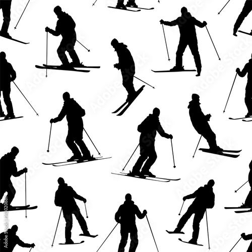 Seamless vector pattern - silhouette of a skiing man