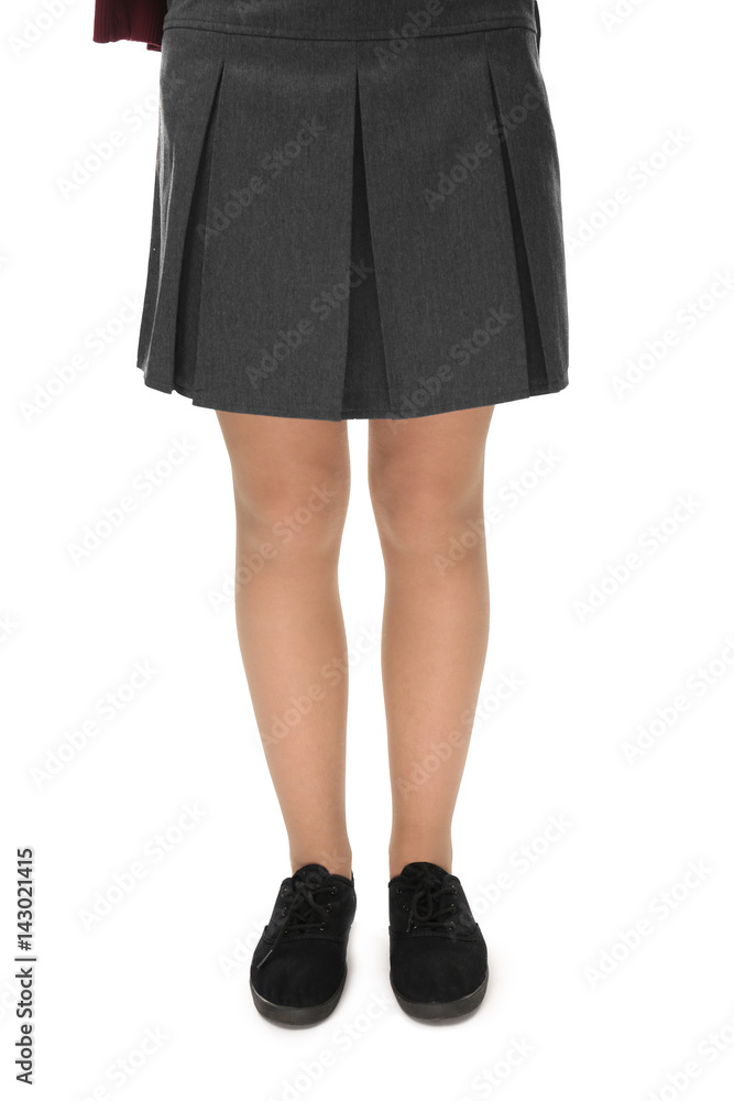 Legs of schoolgirl in uniform on white background Legs of schoolgirl in uniform on white background