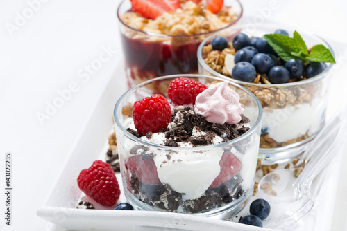 Desserts with fresh berries in glasses