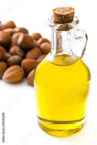 Hazelnuts oil isolated on white background
