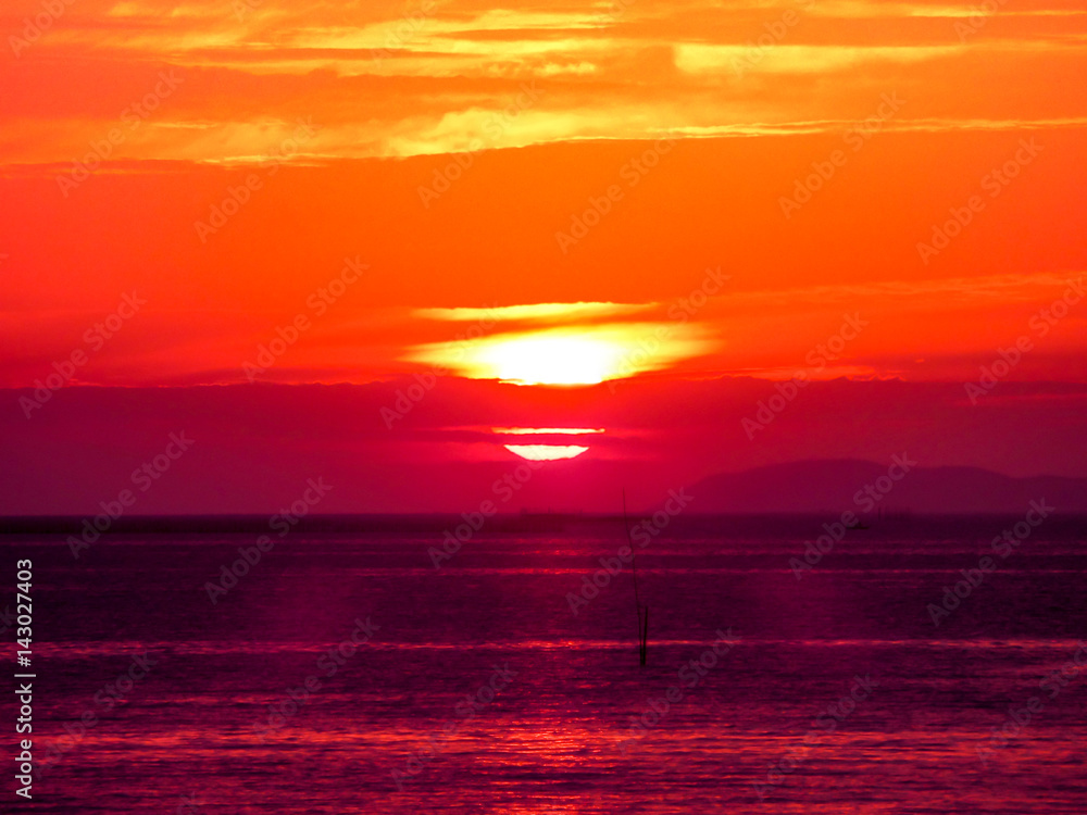 blur sunset last light on horizontal line at the sea