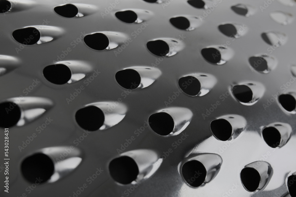 Closeup view of metal grater Closeup view of metal grater