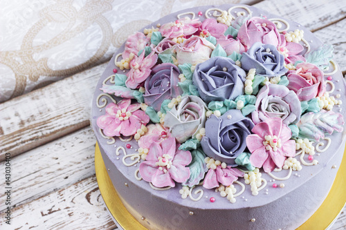 Birthday cake with flowers rose on white background