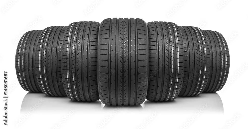 New car tires isolated on white background. New car tires isolated on white background.
