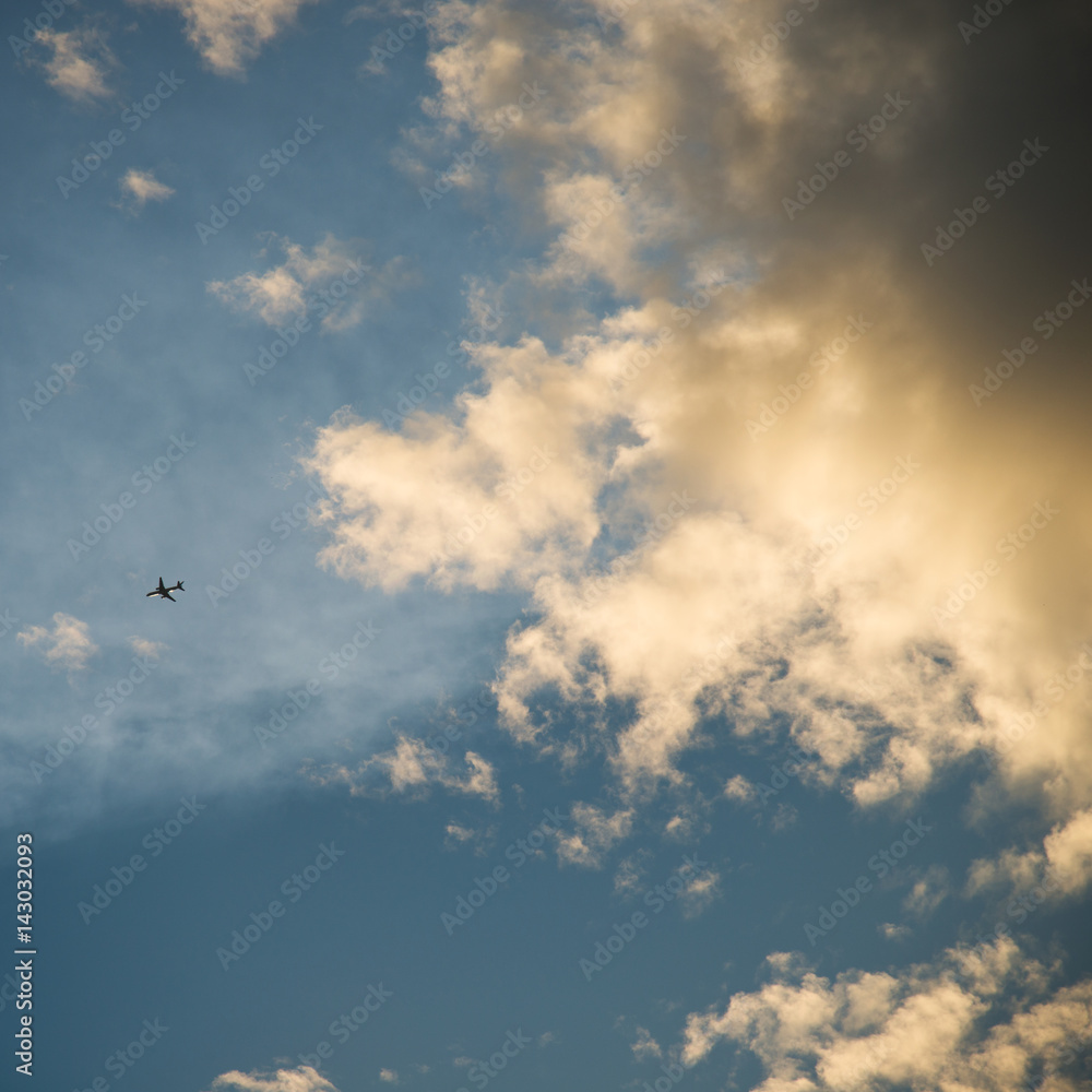 Airplane is flying in the sky among clouds. Airplane is flying in the sky among clouds.